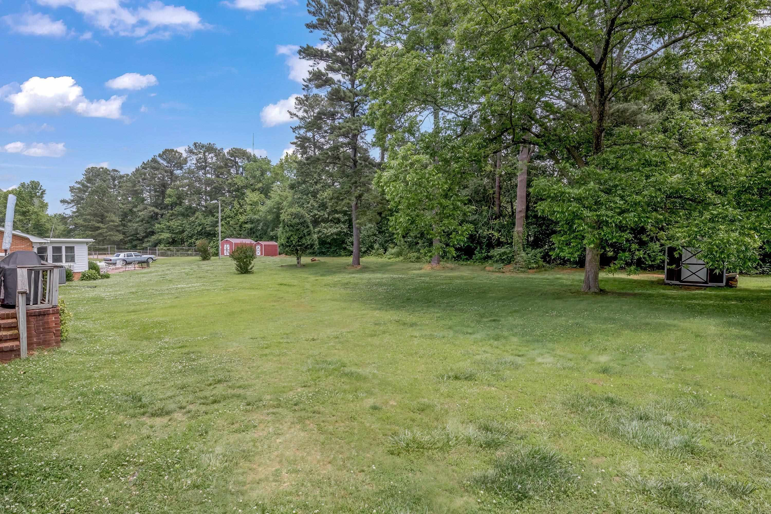 2405 Brenda Drive Raleigh, NC 27610 - Photo 27 of 27 a view of a tree in a yard