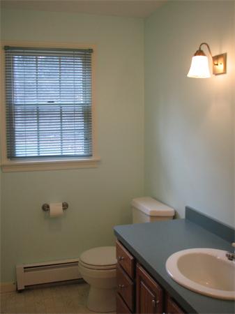 10 Rowley Hill Road Sterling, MA 01564 - Photo 11 of 29 a bathroom with a toilet