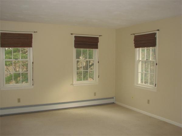 10 Rowley Hill Road Sterling, MA 01564 - Photo 12 of 29 an empty room with a window