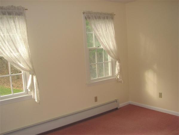 10 Rowley Hill Road Sterling, MA 01564 - Photo 16 of 29 an empty room with windows