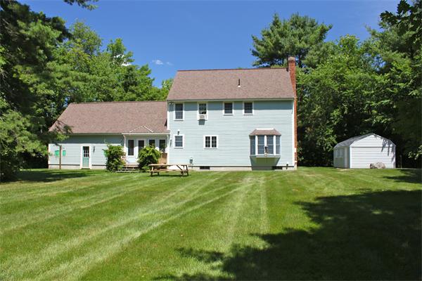 10 Rowley Hill Road Sterling, MA 01564 - Photo 25 of 29 a front view of a house with a yard