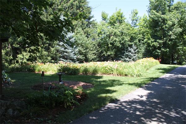 10 Rowley Hill Road Sterling, MA 01564 - Photo 26 of 29 a view of a lake with a yard