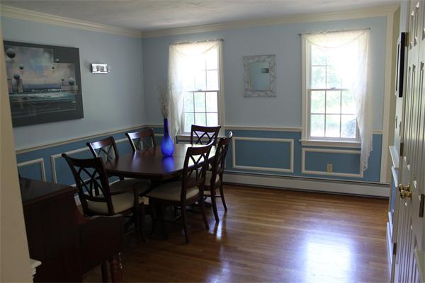10 Rowley Hill Road Sterling, MA 01564 - Photo 6 of 29 a view of a dining room with furniture window and wooden floor
