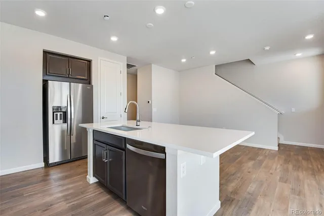 a view of kitchen with wooden floor
