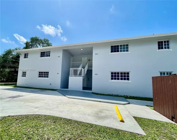 a view of a back yard of the house