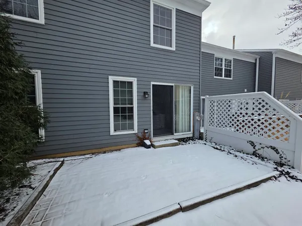 a front view of a house with a garage