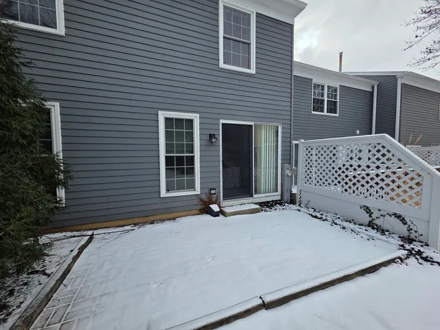 a front view of a house with a garage