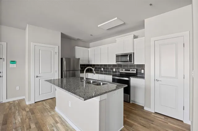 a view of kitchen cabinets