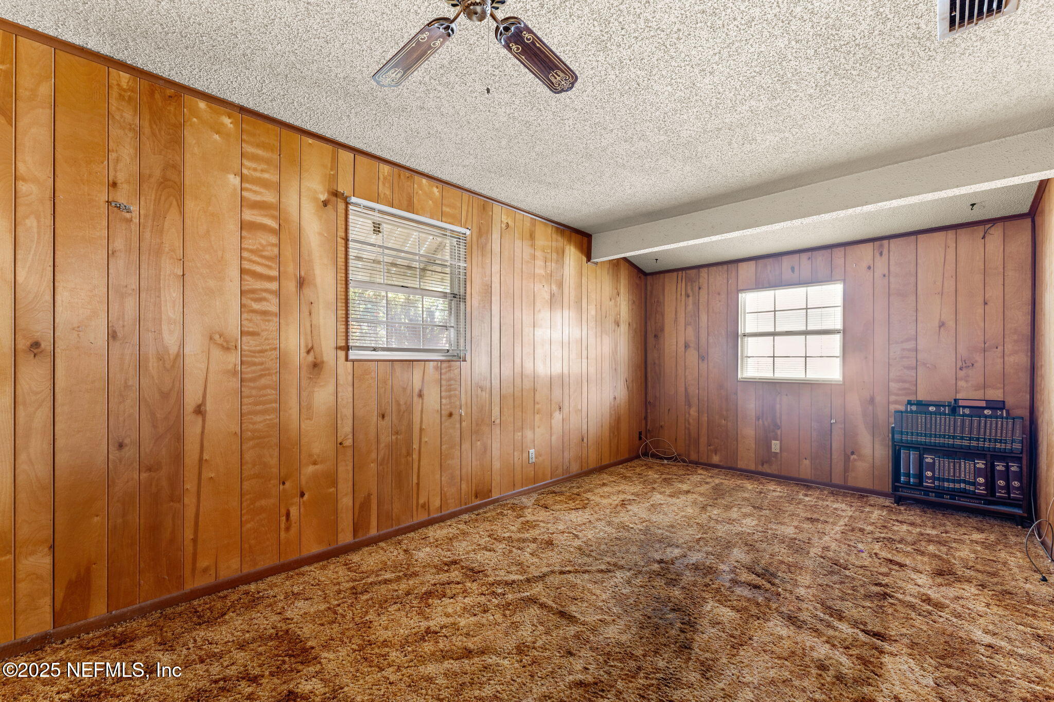 10887 Player Road West Jacksonville, FL 32218 - Photo 14 of 26 a view of an empty room with a window