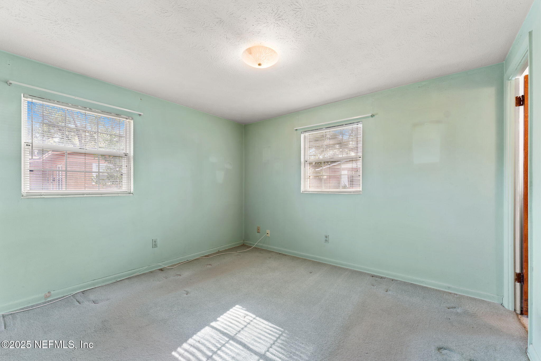 10887 Player Road West Jacksonville, FL 32218 - Photo 16 of 26 a view of room with window