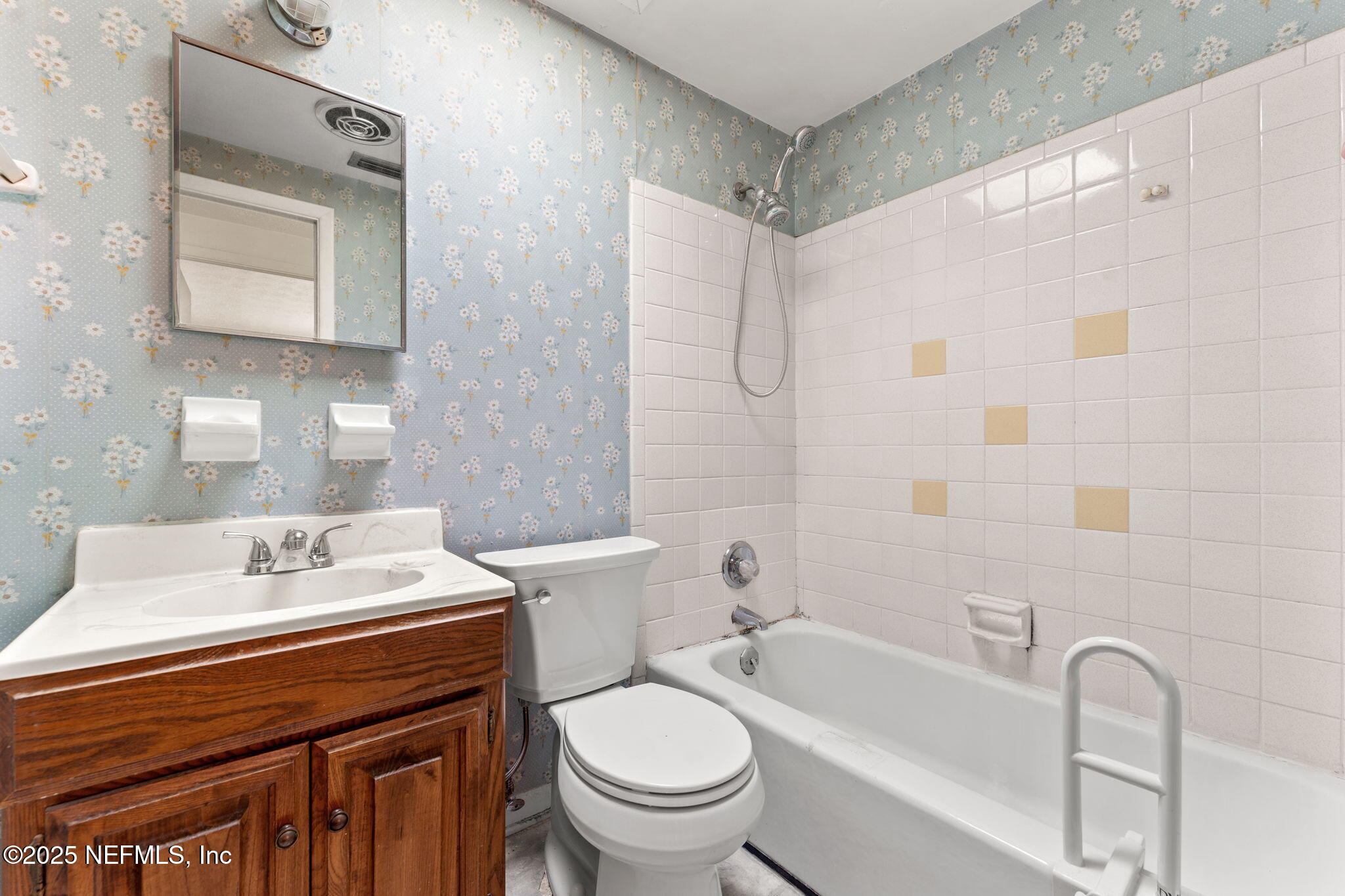 10887 Player Road West Jacksonville, FL 32218 - Photo 21 of 26 a bathroom with a sink a toilet and shower