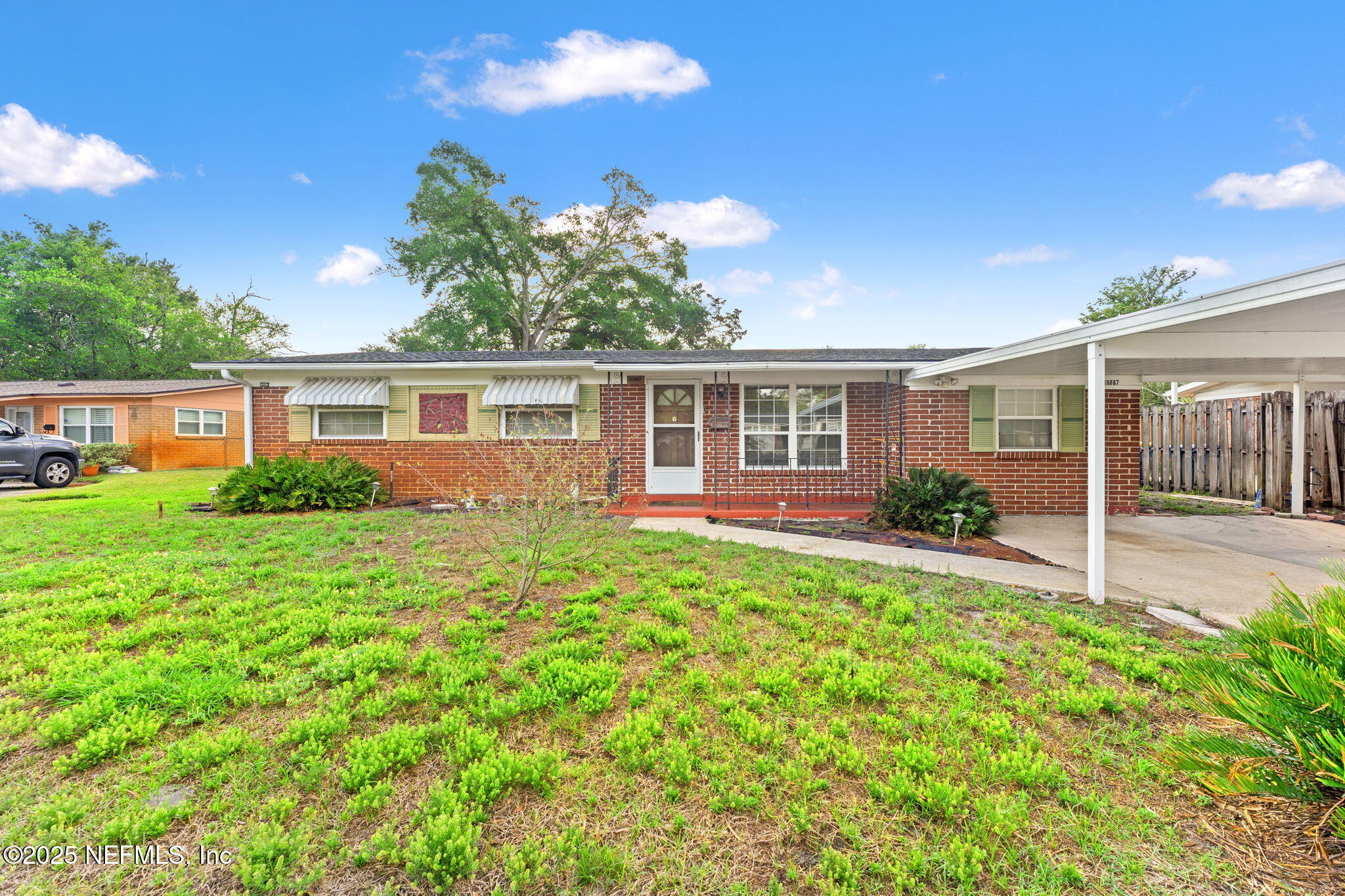 10887 Player Road West Jacksonville, FL 32218 - Photo 3 of 26 front view of a house with a yard