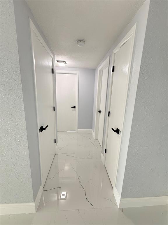 10433 Laburnum Drive Port Richey, FL 34668 - Photo 6 of 26 a view of a hallway