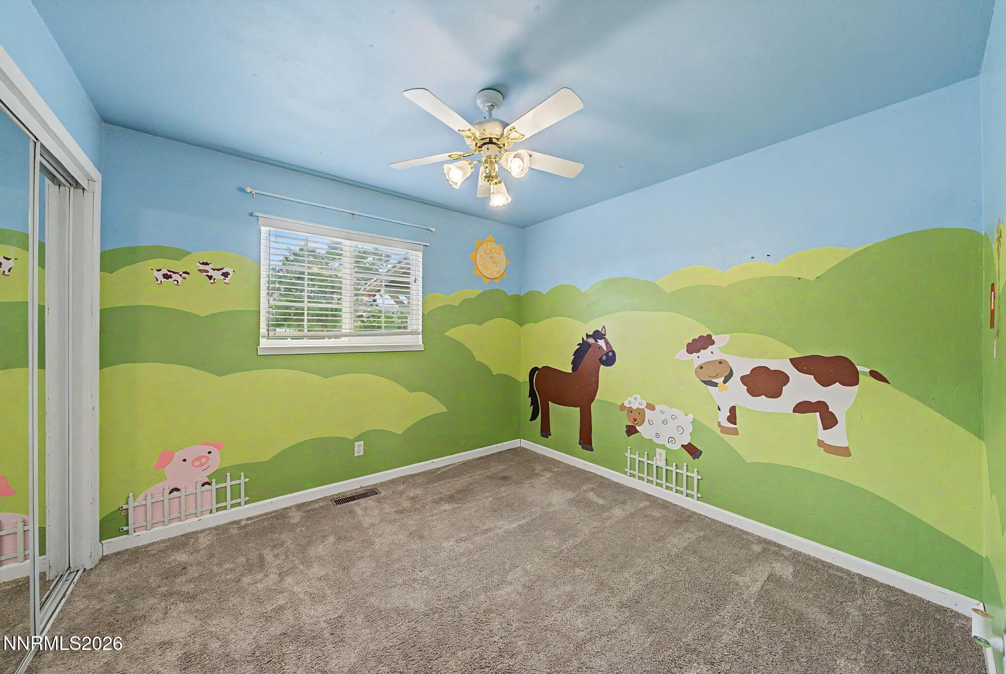 11577 Deodar Way Reno, NV 89506 - Photo 28 of 58 a view of a room with window and fan