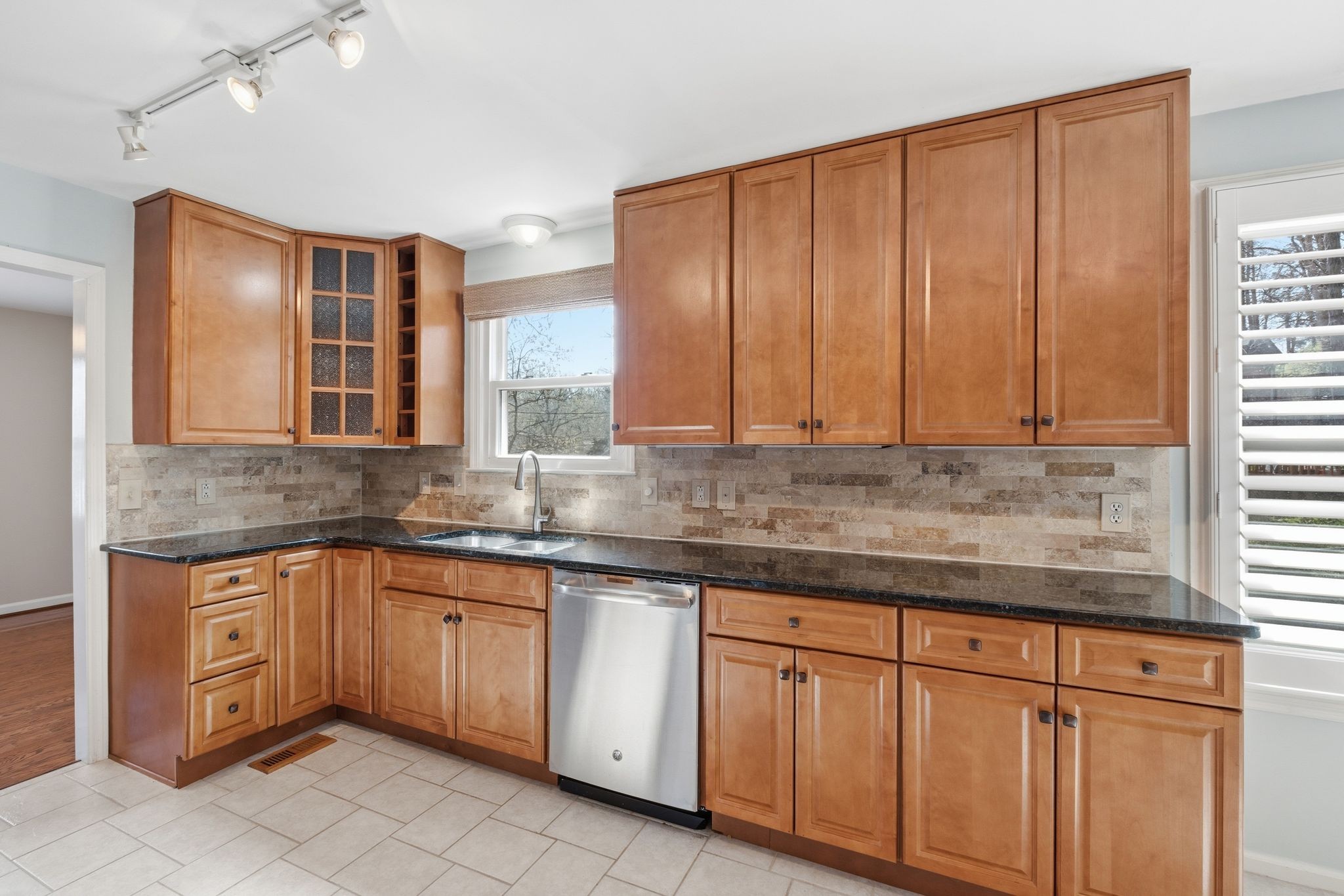 1049 Fitzpatrick Road Nashville, TN 37214 - Photo 11 of 38 a kitchen with stainless steel appliances granite countertop cabinets and window