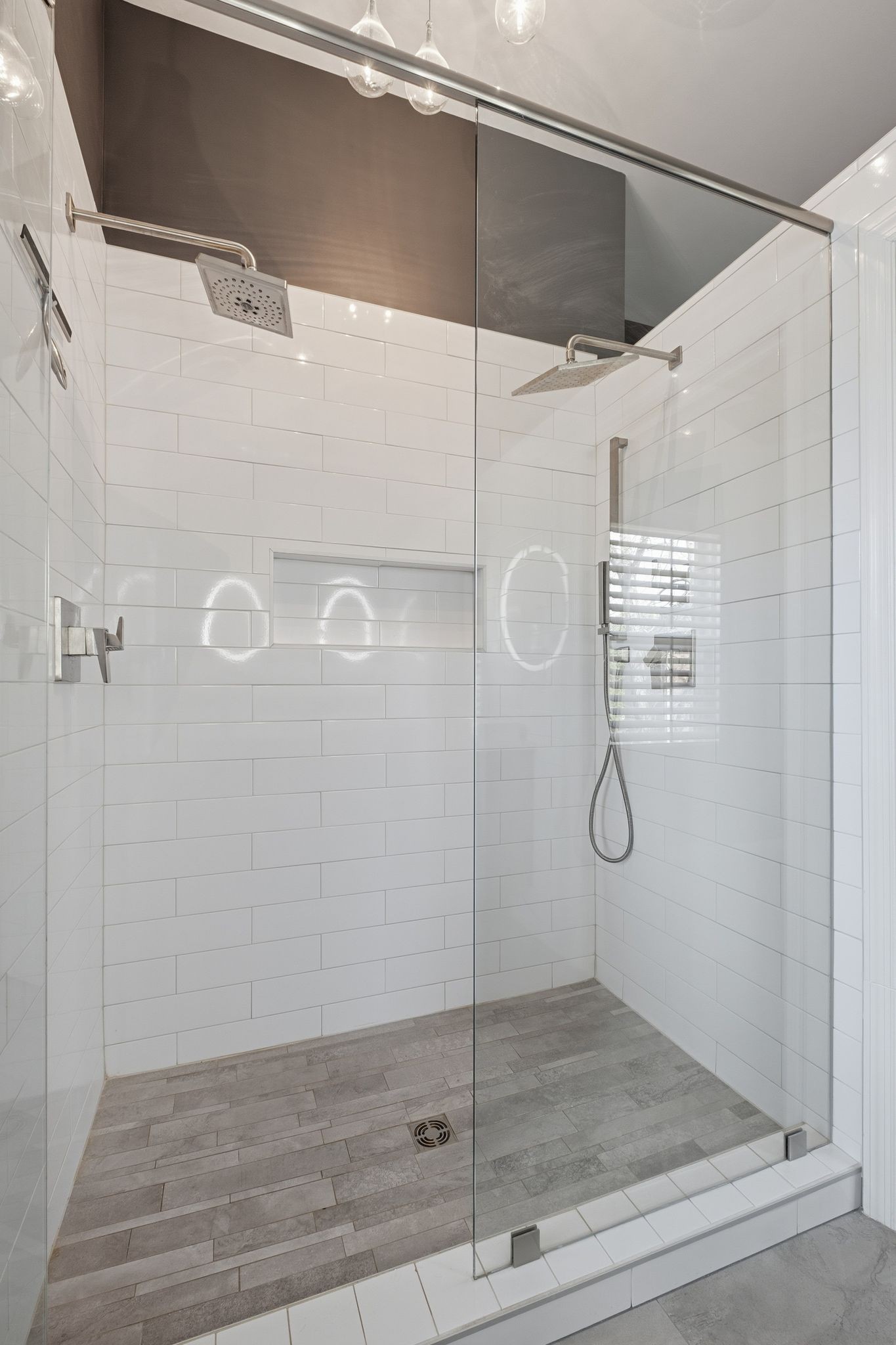 1049 Fitzpatrick Road Nashville, TN 37214 - Photo 16 of 38 a bathroom with a glass shower door
