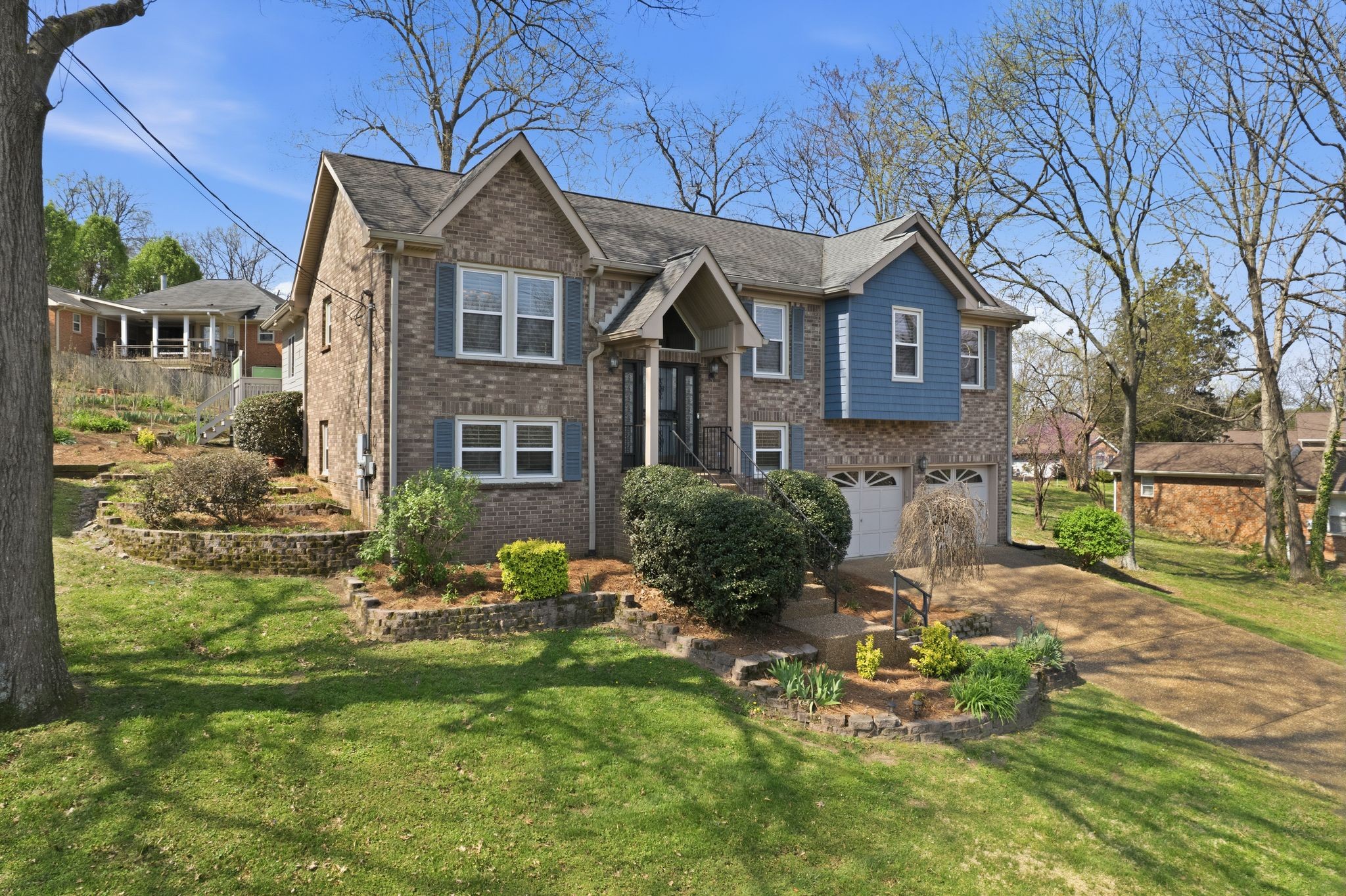 1049 Fitzpatrick Road Nashville, TN 37214 - Photo 2 of 38 a front view of a house with a yard