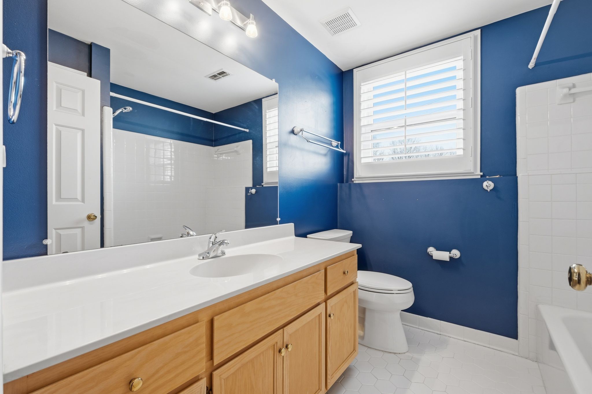 1049 Fitzpatrick Road Nashville, TN 37214 - Photo 27 of 38 a bathroom with a sink a toilet and shower
