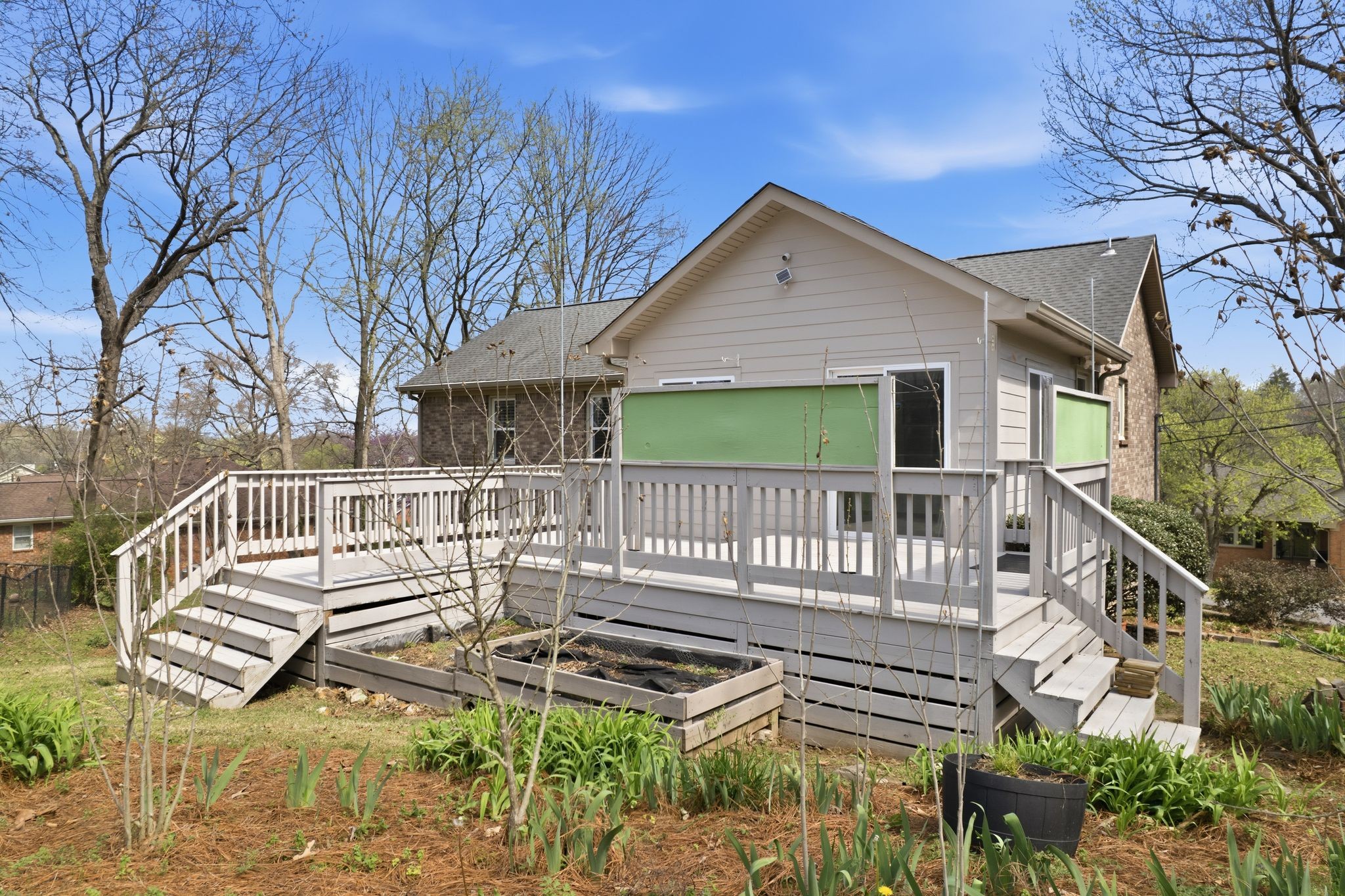 1049 Fitzpatrick Road Nashville, TN 37214 - Photo 36 of 38 a view of a house with wooden deck and furniture