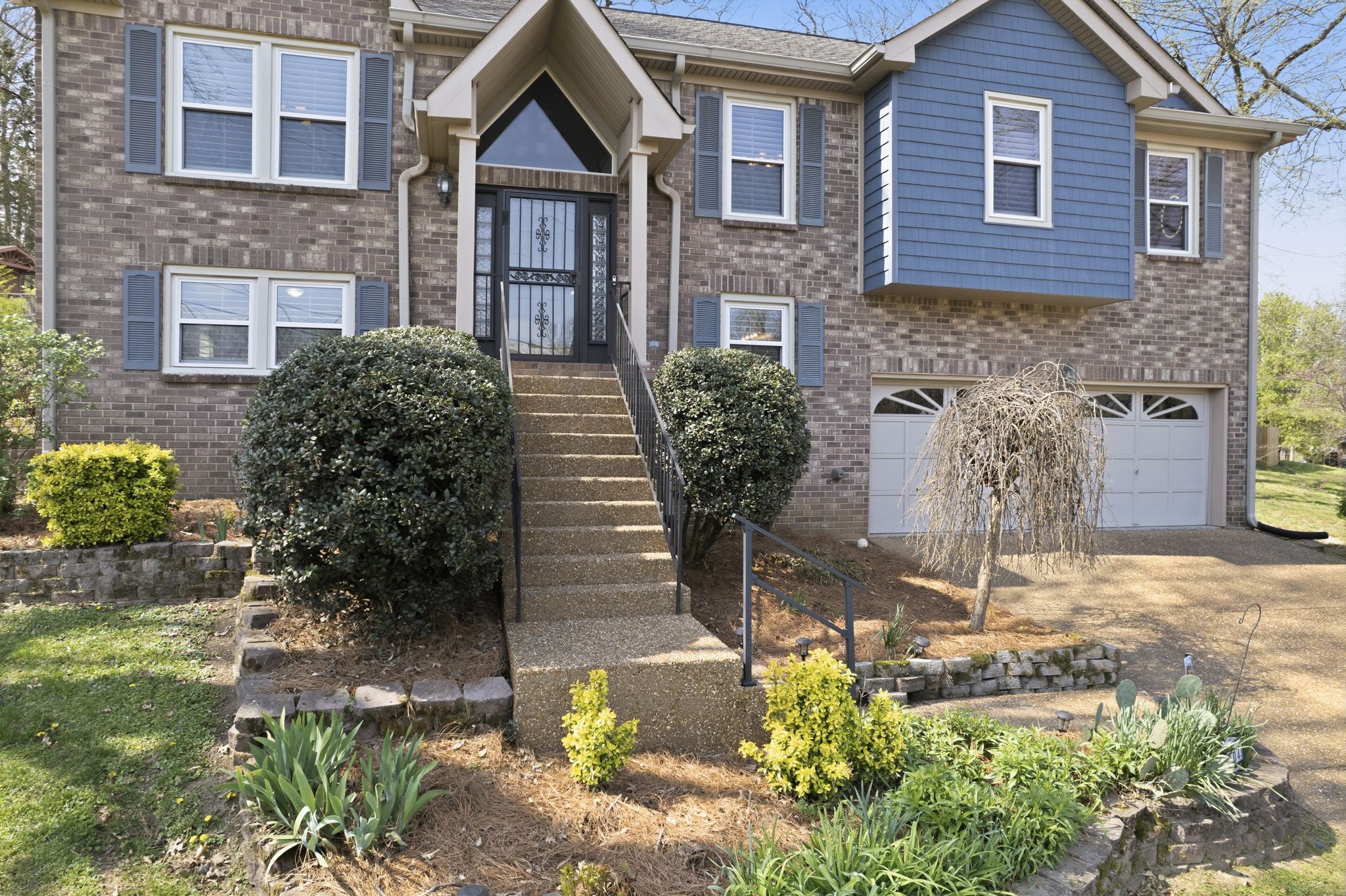 1049 Fitzpatrick Road Nashville, TN 37214 - Photo 38 of 38 a front view of a house with a yard
