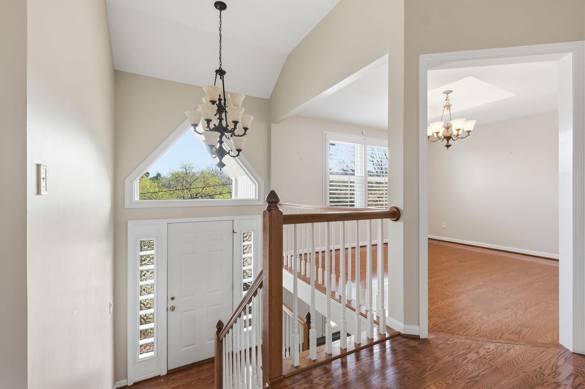 1049 Fitzpatrick Road Nashville, TN 37214 - Photo 5 of 38 a view of a hallway to a bedroom with wooden floor and windows