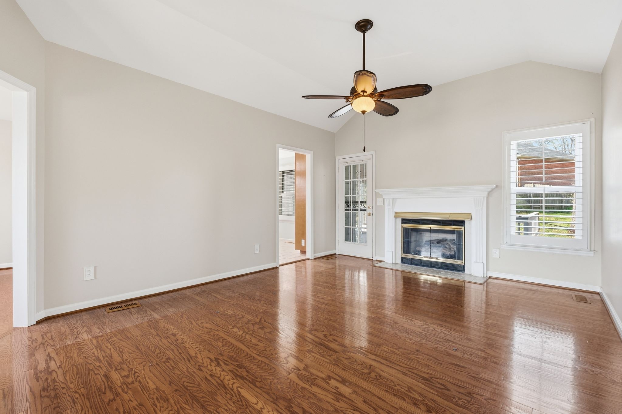 1049 Fitzpatrick Road Nashville, TN 37214 - Photo 6 of 38 a view of a room with wooden floor ceiling fan