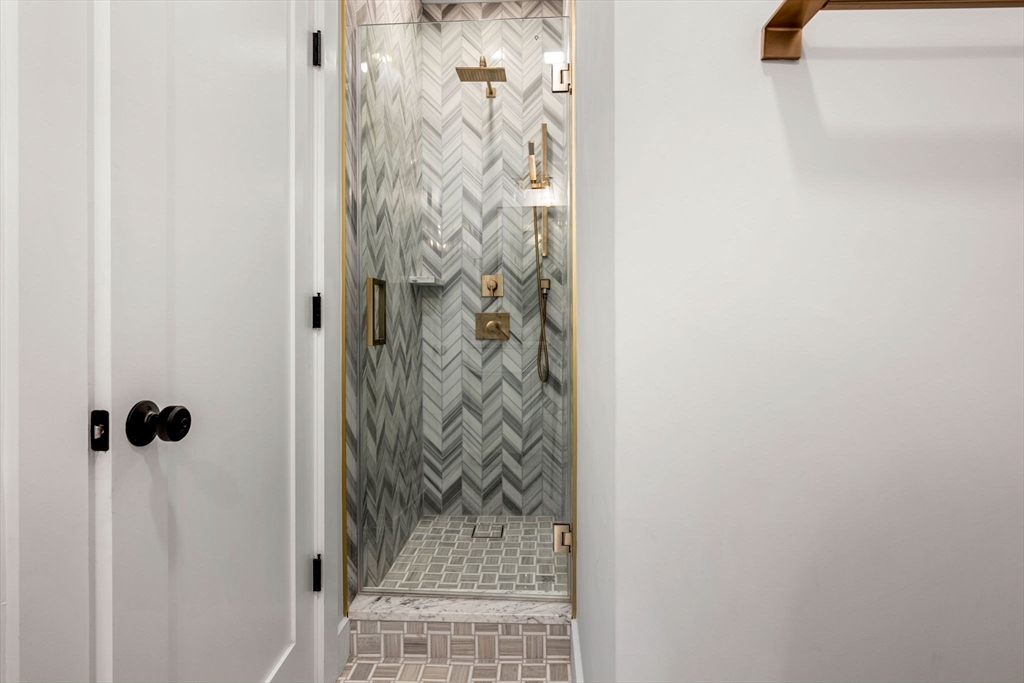 67 Revere Street, Unit 1 Boston, MA 02114 - Photo 22 of 29 a bathroom with a shower