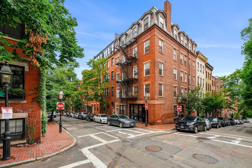 67 Revere Street, Unit 1 Boston, MA 02114 - Photo 29 of 29 a view of a building with street view