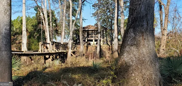 a view of a lake with houses in outdoor space