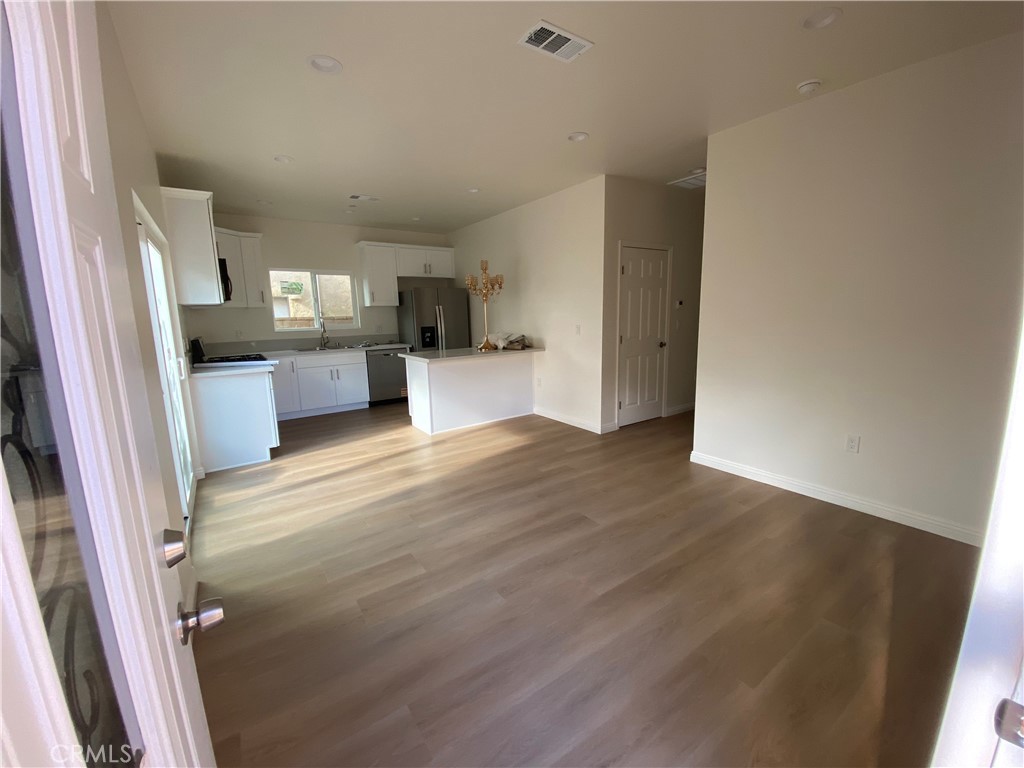 18543 Ingomar Street Reseda, CA 91335 - Photo 4 of 10 a view of kitchen and sink