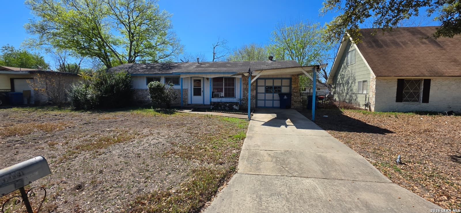5414 Boatman Road Kirby, TX 78219 - Photo 1 of 15 a front view of a house with a yard and trees