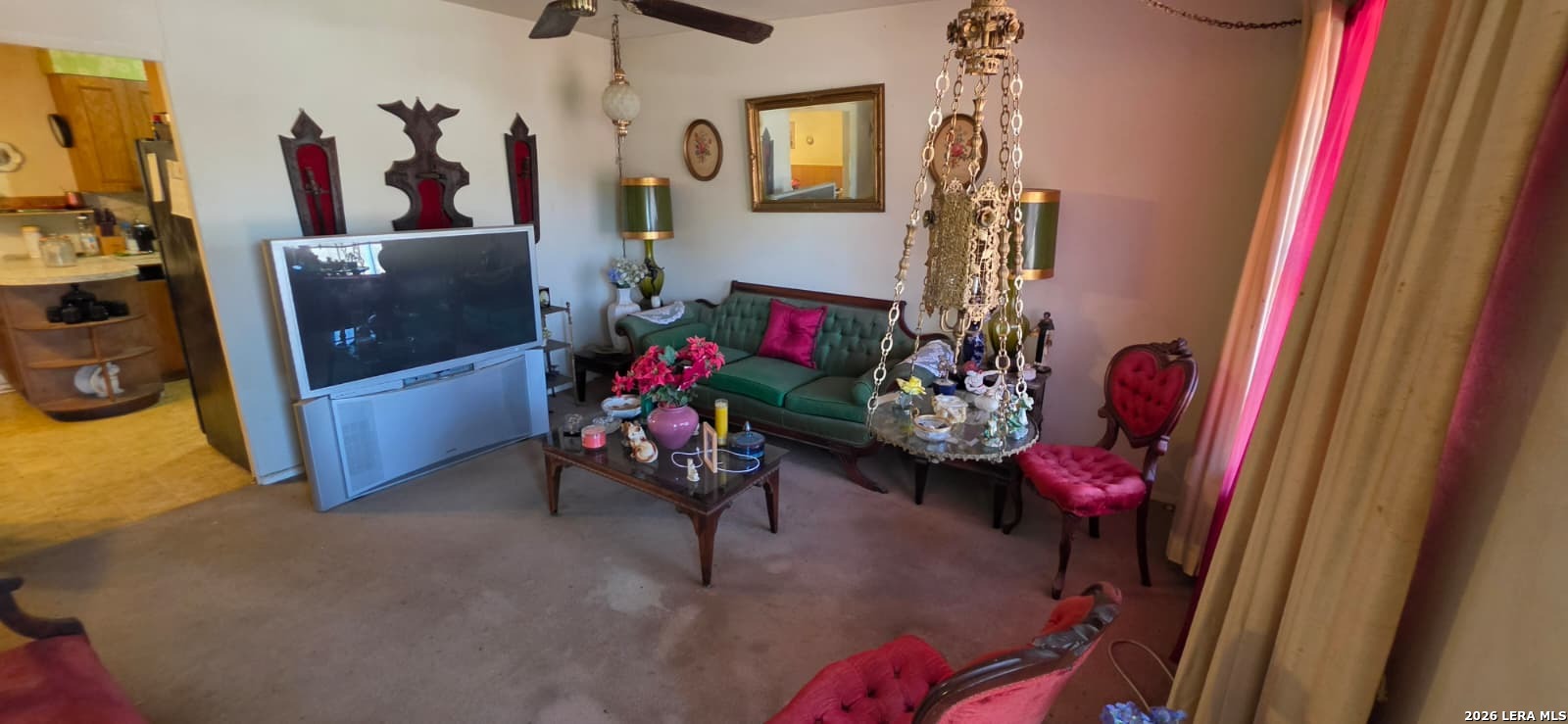 5414 Boatman Road Kirby, TX 78219 - Photo 12 of 15 a living room with furniture and a flat screen tv