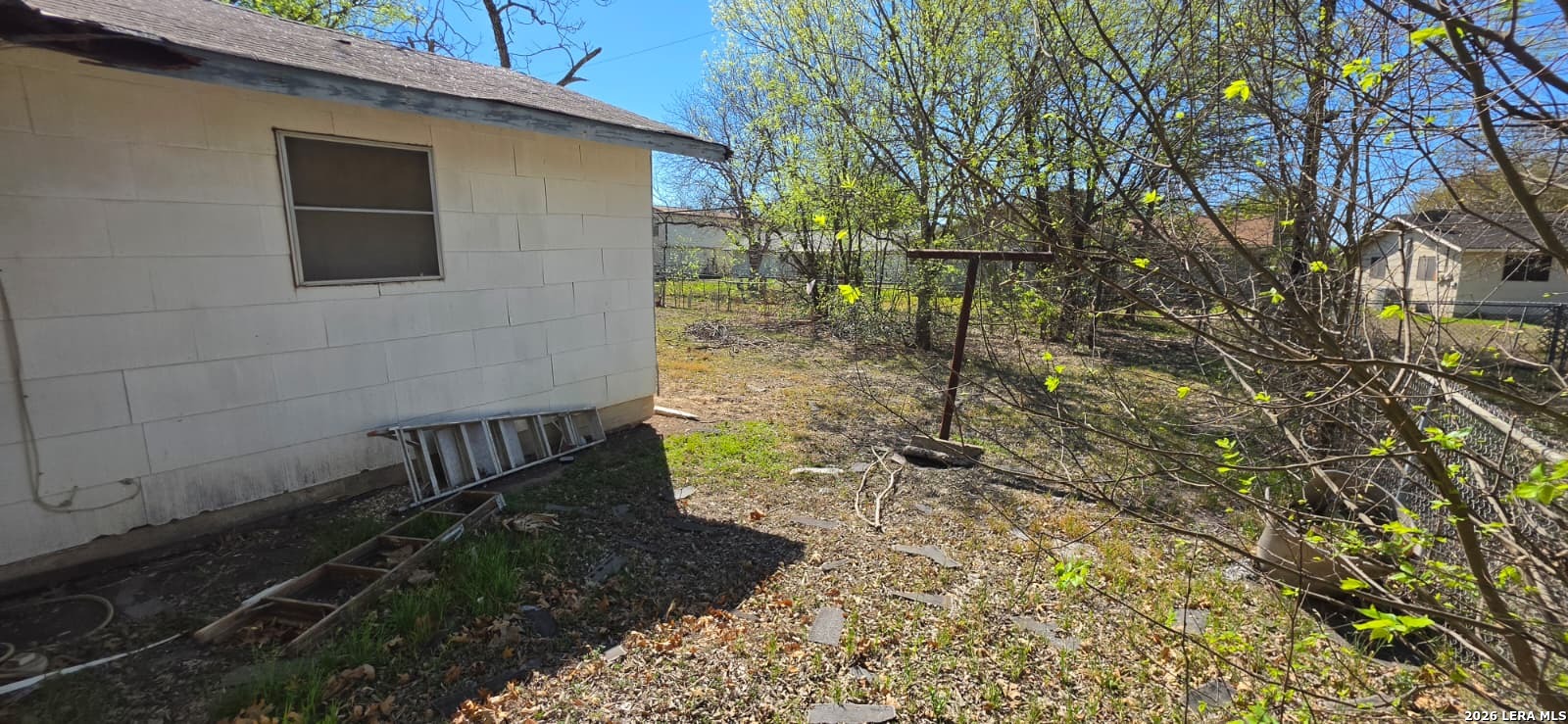 5414 Boatman Road Kirby, TX 78219 - Photo 15 of 15 a pathway of a house with a yard