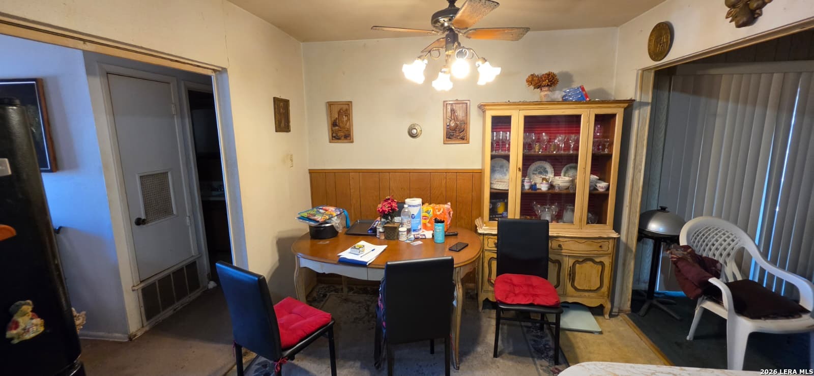 5414 Boatman Road Kirby, TX 78219 - Photo 3 of 15 a view of a dining room with furniture and chandelier