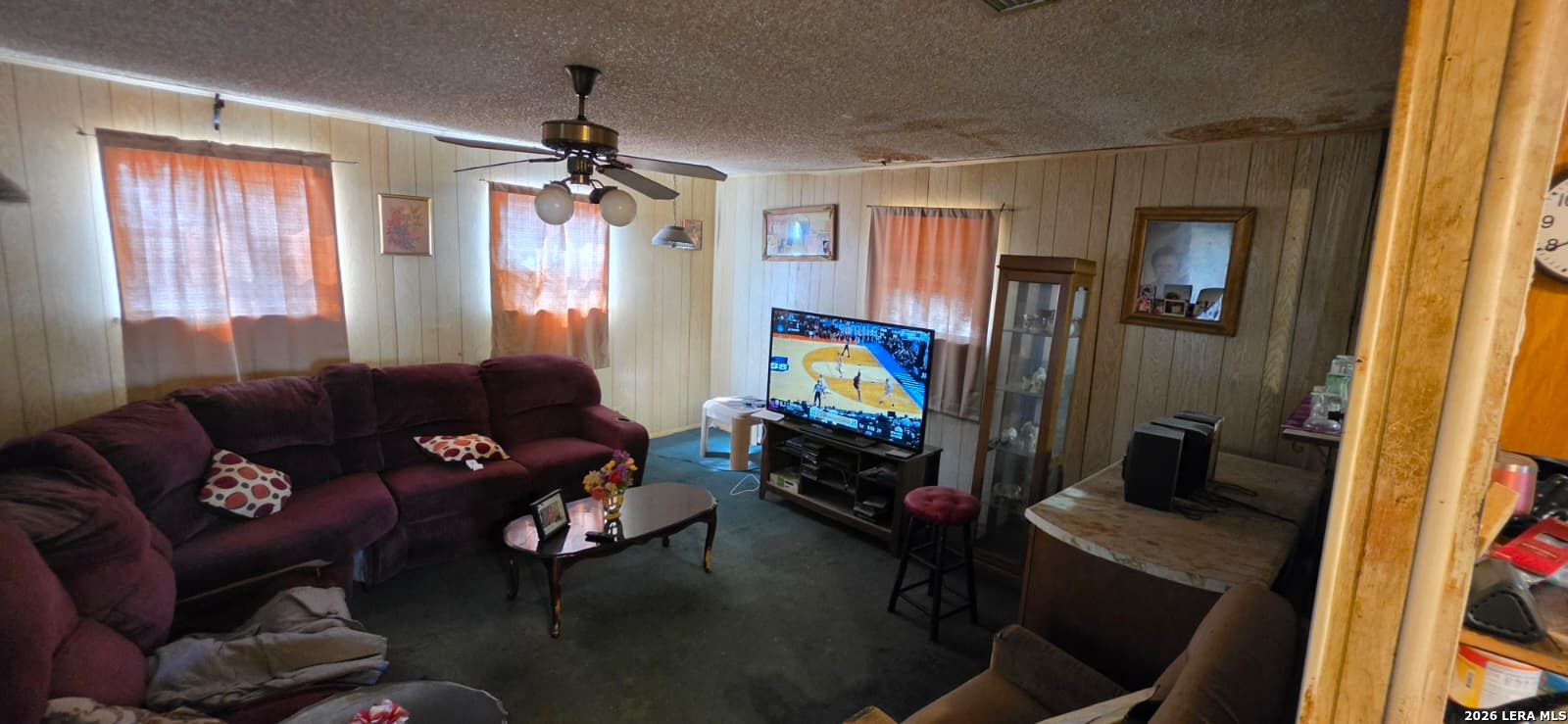 5414 Boatman Road Kirby, TX 78219 - Photo 4 of 15 a living room with furniture and a flat screen tv