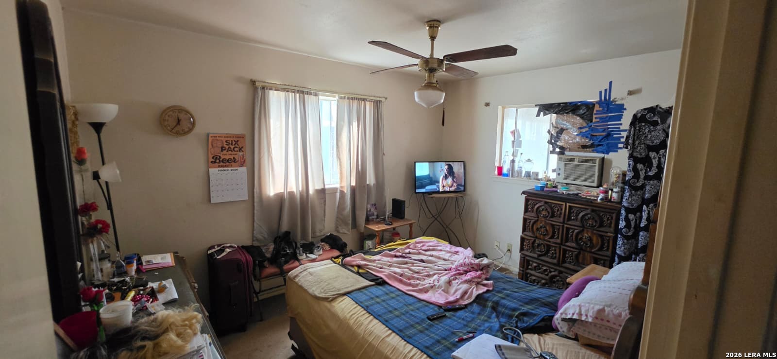 5414 Boatman Road Kirby, TX 78219 - Photo 8 of 15 a bedroom with bed and a window