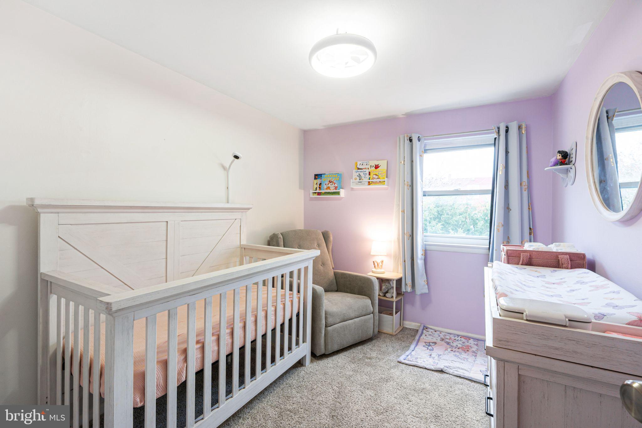 12313 Dunks Ferry Road Philadelphia, PA 19154 - Photo 18 of 29 a bedroom with a bed and a window