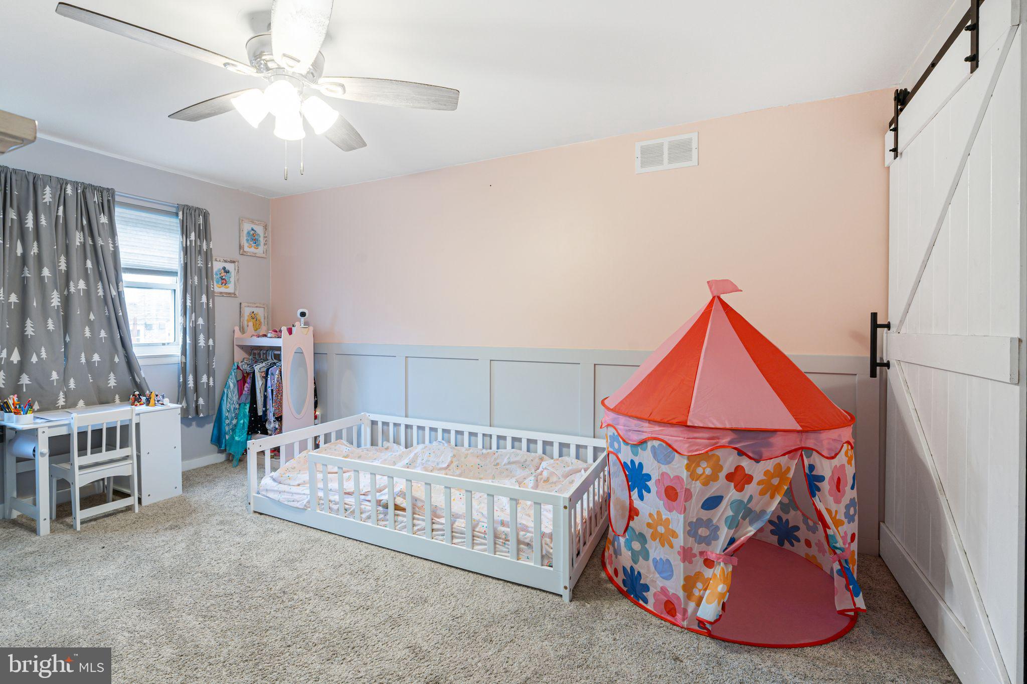 12313 Dunks Ferry Road Philadelphia, PA 19154 - Photo 19 of 29 a bedroom with furniture and a chandelier