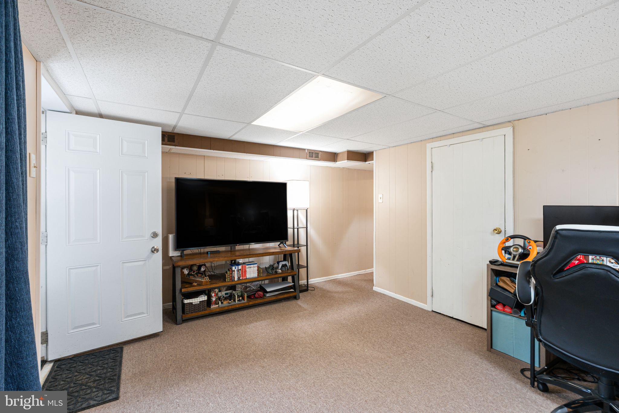 12313 Dunks Ferry Road Philadelphia, PA 19154 - Photo 22 of 29 a view of a livingroom with furniture and a flat screen tv