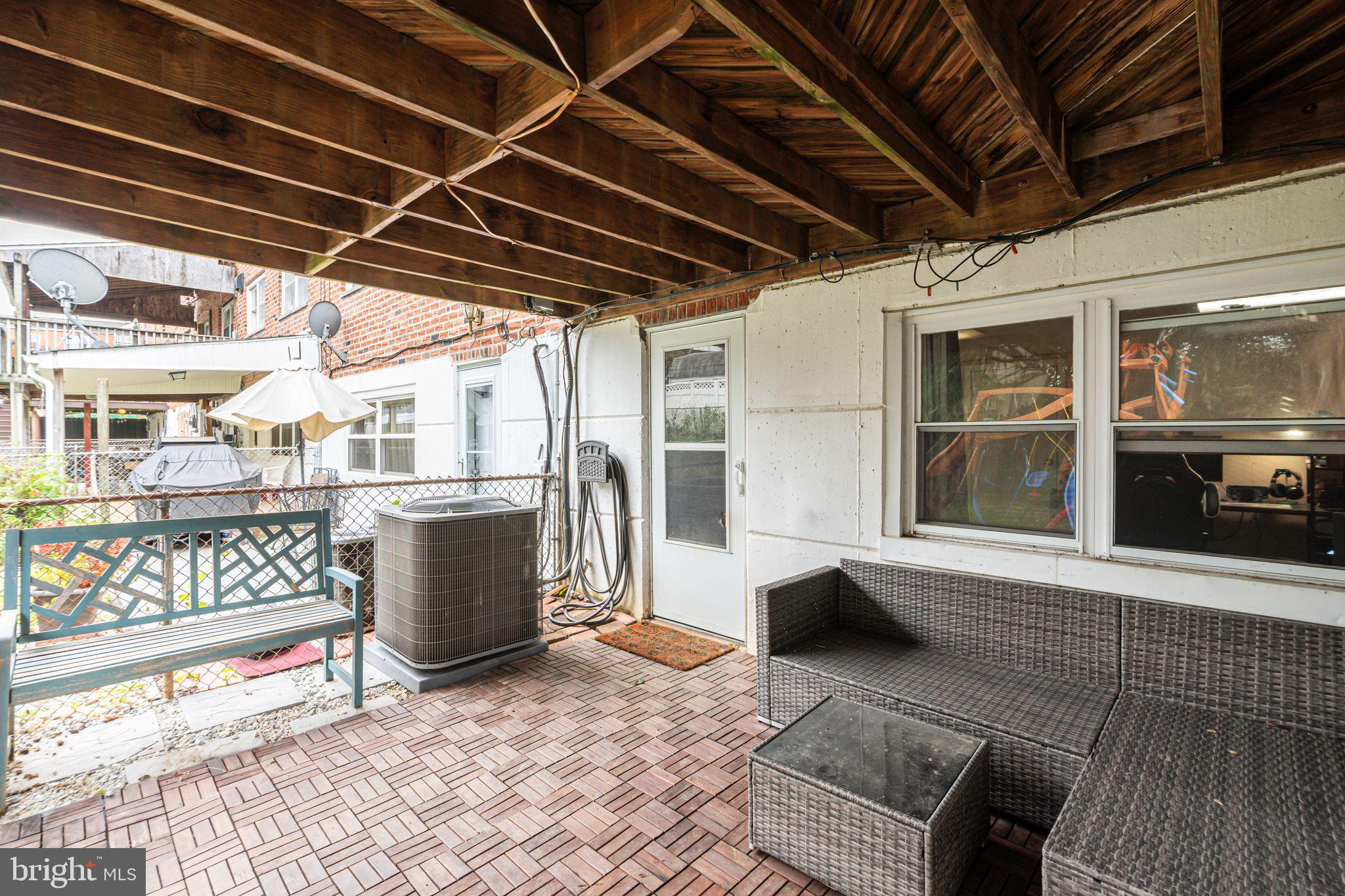 12313 Dunks Ferry Road Philadelphia, PA 19154 - Photo 27 of 29 a view of a porch with furniture and next to a window