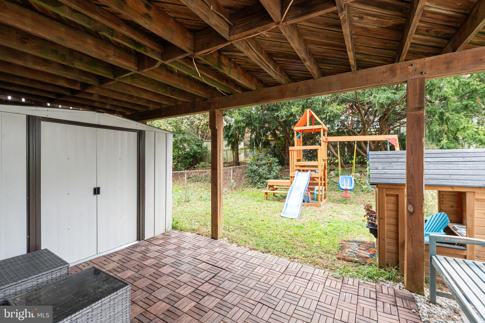 12313 Dunks Ferry Road Philadelphia, PA 19154 - Photo 28 of 29 a backyard of a house with garden and outdoor seating
