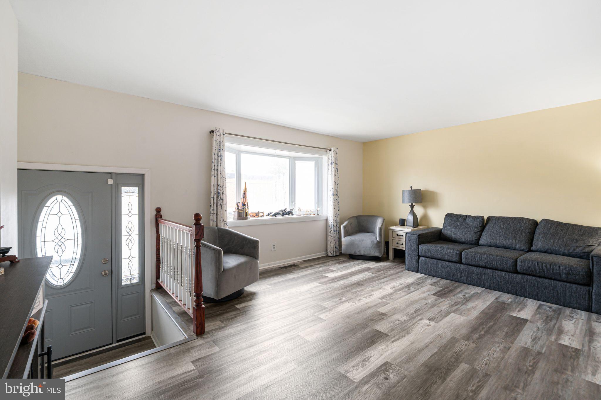 12313 Dunks Ferry Road Philadelphia, PA 19154 - Photo 3 of 29 a living room with furniture and a window