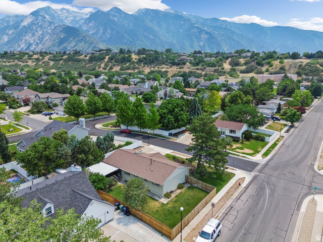 2693 Teal Way Sandy, UT 84093 - Photo 46 of 50 Aerial depiction of a residential neighborhood featuring established homes and mature trees