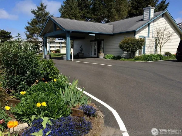a view of a house with a street