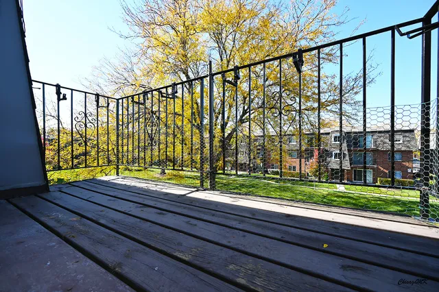 a view of street from balcony