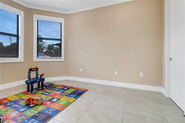 a very nice looking room with a black and white checkered floor