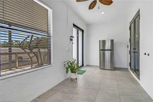 a view of entryway with livingroom and hallway