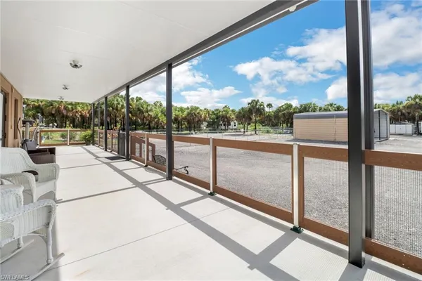 a view of a balcony with workspace