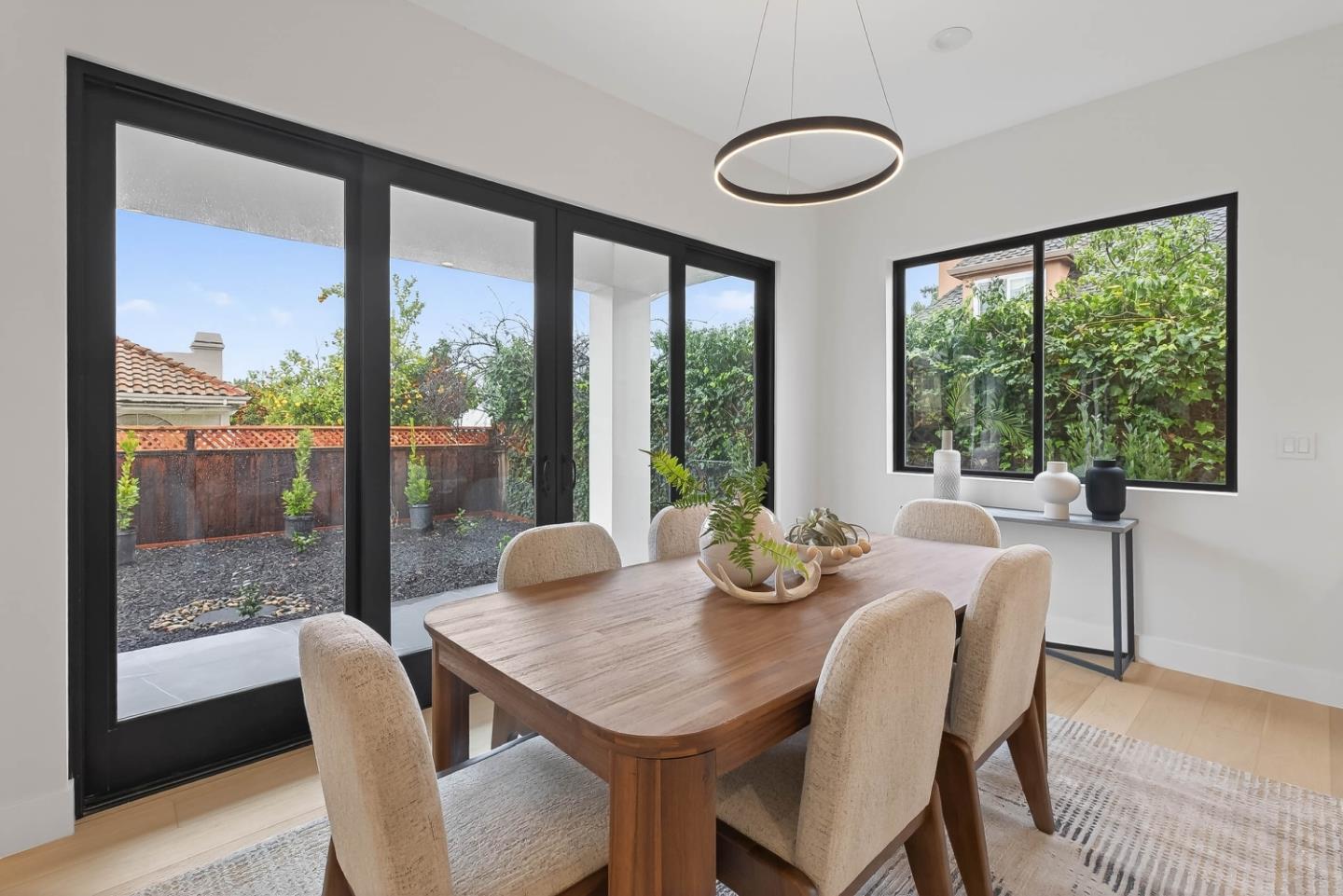 10468 South Stelling Road Cupertino, CA 95014 - Photo 12 of 45 a view of a dining room with furniture window and outside view
