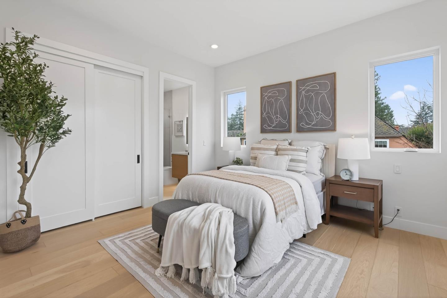 10468 South Stelling Road Cupertino, CA 95014 - Photo 18 of 45 a bedroom with a bed and a potted plant